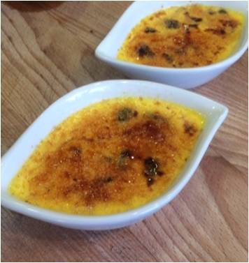 Crème brûlée with broken olives