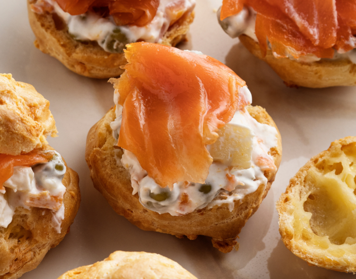 Lemon cream gougères with salmon and green tapenade